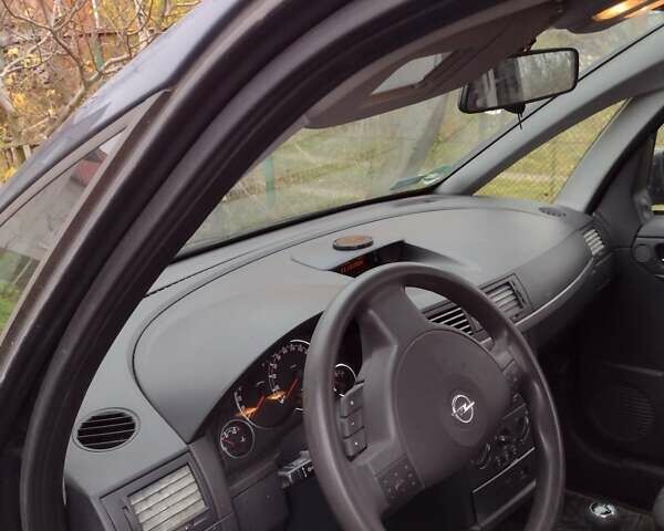 Синий Опель Мерива, объемом двигателя 1.6 л и пробегом 227 тыс. км за 4900 $, фото 5 на Automoto.ua