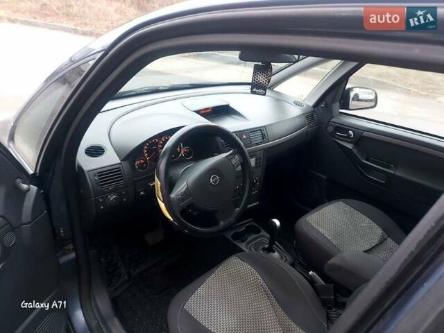 Синий Опель Мерива, объемом двигателя 1.6 л и пробегом 250 тыс. км за 4100 $, фото 12 на Automoto.ua