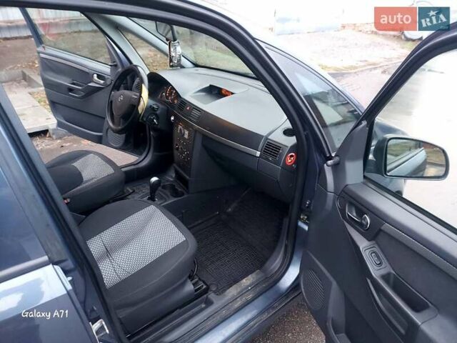 Синий Опель Мерива, объемом двигателя 1.6 л и пробегом 250 тыс. км за 4100 $, фото 23 на Automoto.ua