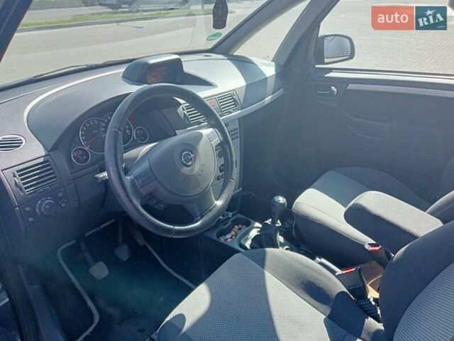 Синий Опель Мерива, объемом двигателя 1.36 л и пробегом 242 тыс. км за 4158 $, фото 3 на Automoto.ua