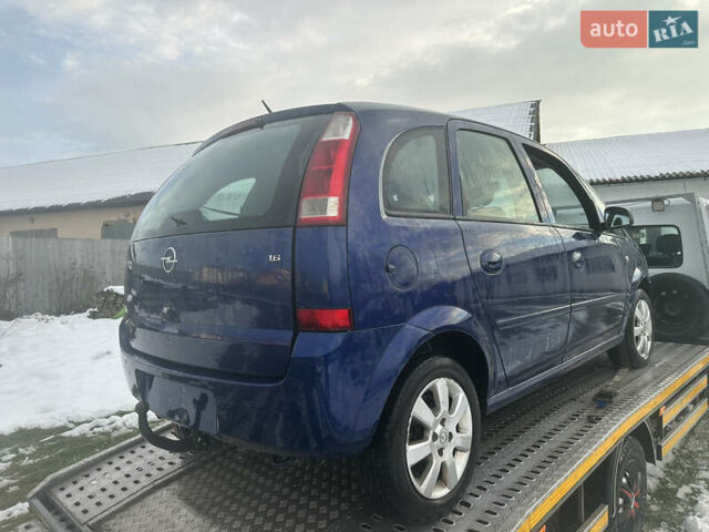 Синий Опель Мерива, объемом двигателя 1.6 л и пробегом 210 тыс. км за 2200 $, фото 3 на Automoto.ua