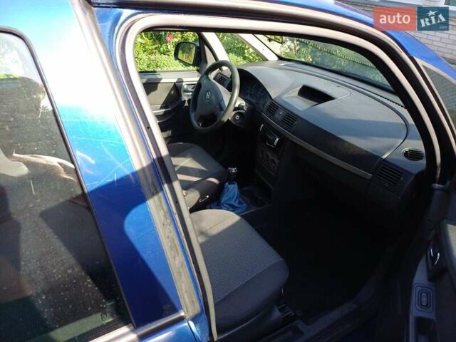 Синий Опель Мерива, объемом двигателя 1.6 л и пробегом 254 тыс. км за 4200 $, фото 7 на Automoto.ua