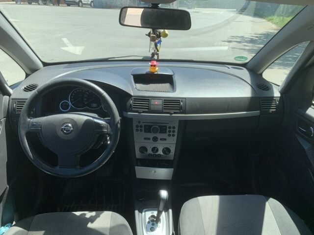 Синий Опель Мерива, объемом двигателя 1.6 л и пробегом 257 тыс. км за 4800 $, фото 5 на Automoto.ua