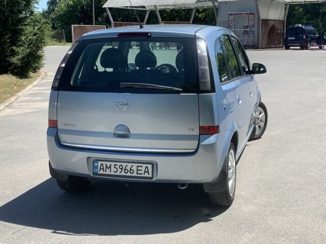 Синий Опель Мерива, объемом двигателя 1.6 л и пробегом 257 тыс. км за 4800 $, фото 3 на Automoto.ua