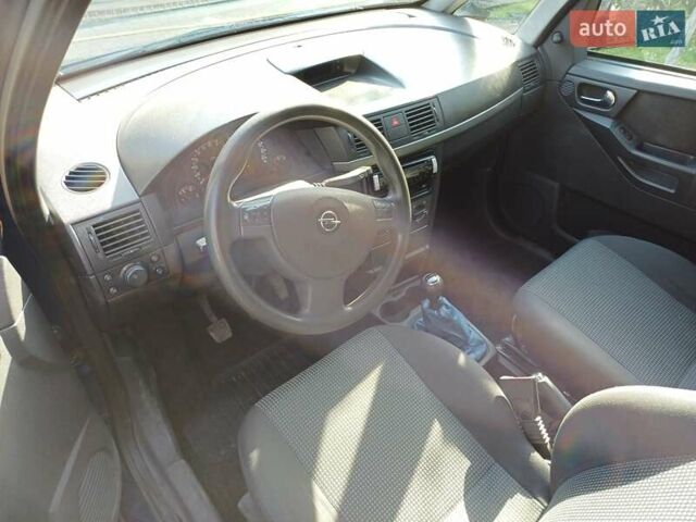 Синий Опель Мерива, объемом двигателя 1.6 л и пробегом 254 тыс. км за 4200 $, фото 6 на Automoto.ua