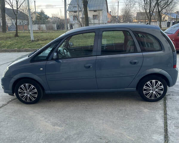 Синій Опель Меріва, об'ємом двигуна 1.4 л та пробігом 164 тис. км за 4399 $, фото 5 на Automoto.ua