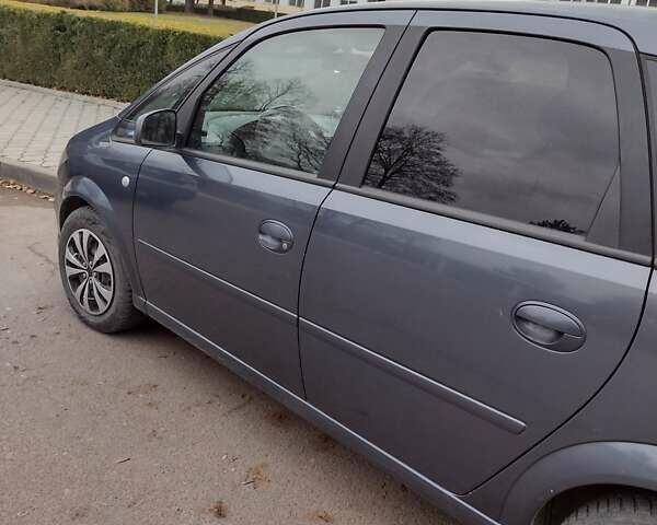 Синий Опель Мерива, объемом двигателя 1.6 л и пробегом 227 тыс. км за 4900 $, фото 9 на Automoto.ua