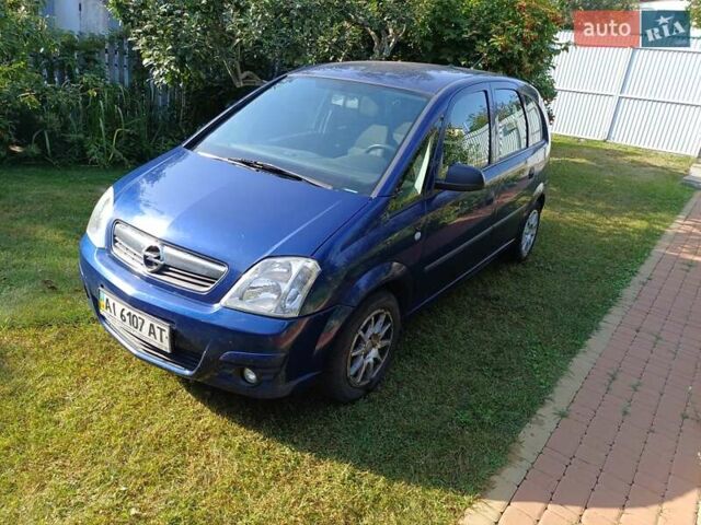 Синий Опель Мерива, объемом двигателя 1.6 л и пробегом 254 тыс. км за 4200 $, фото 1 на Automoto.ua