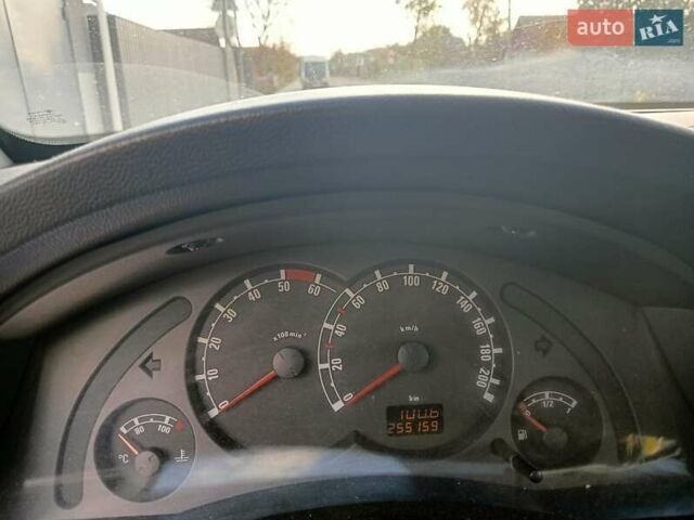Синий Опель Мерива, объемом двигателя 1.25 л и пробегом 255 тыс. км за 4100 $, фото 2 на Automoto.ua
