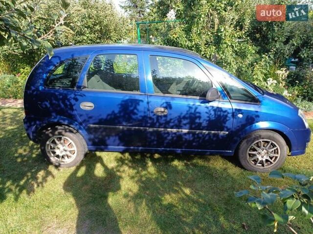 Синий Опель Мерива, объемом двигателя 1.6 л и пробегом 254 тыс. км за 4200 $, фото 5 на Automoto.ua