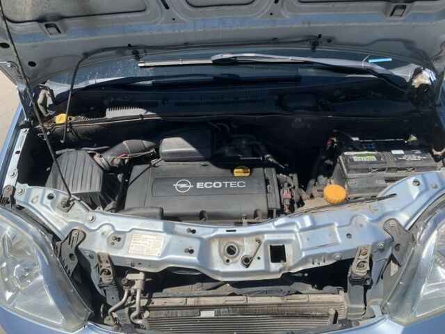 Синий Опель Мерива, объемом двигателя 1.6 л и пробегом 257 тыс. км за 4800 $, фото 7 на Automoto.ua