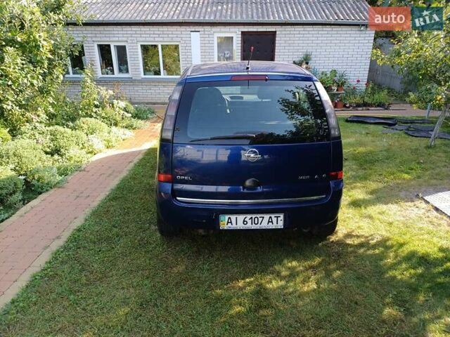 Синий Опель Мерива, объемом двигателя 1.6 л и пробегом 254 тыс. км за 4200 $, фото 3 на Automoto.ua