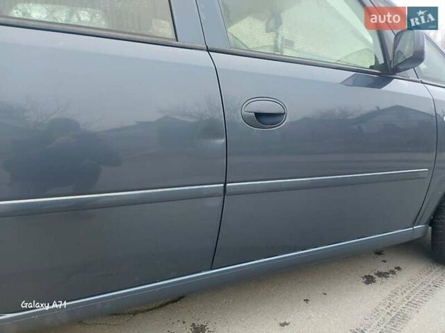 Синий Опель Мерива, объемом двигателя 1.6 л и пробегом 250 тыс. км за 4100 $, фото 3 на Automoto.ua