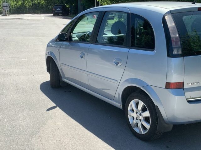 Синий Опель Мерива, объемом двигателя 1.6 л и пробегом 257 тыс. км за 4800 $, фото 4 на Automoto.ua