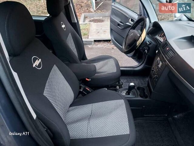 Синий Опель Мерива, объемом двигателя 1.6 л и пробегом 250 тыс. км за 4100 $, фото 25 на Automoto.ua