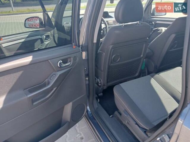 Синий Опель Мерива, объемом двигателя 1.36 л и пробегом 242 тыс. км за 4158 $, фото 1 на Automoto.ua