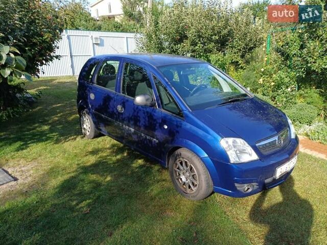 Синий Опель Мерива, объемом двигателя 1.6 л и пробегом 254 тыс. км за 4200 $, фото 2 на Automoto.ua