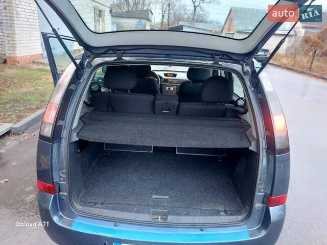 Синий Опель Мерива, объемом двигателя 1.6 л и пробегом 250 тыс. км за 4100 $, фото 22 на Automoto.ua