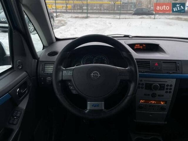 Синий Опель Мерива, объемом двигателя 1.6 л и пробегом 298 тыс. км за 4990 $, фото 13 на Automoto.ua