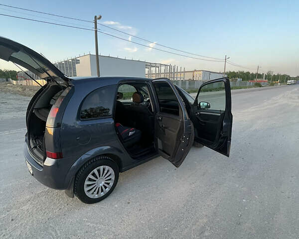 Синий Опель Мерива, объемом двигателя 1.69 л и пробегом 262 тыс. км за 3550 $, фото 25 на Automoto.ua