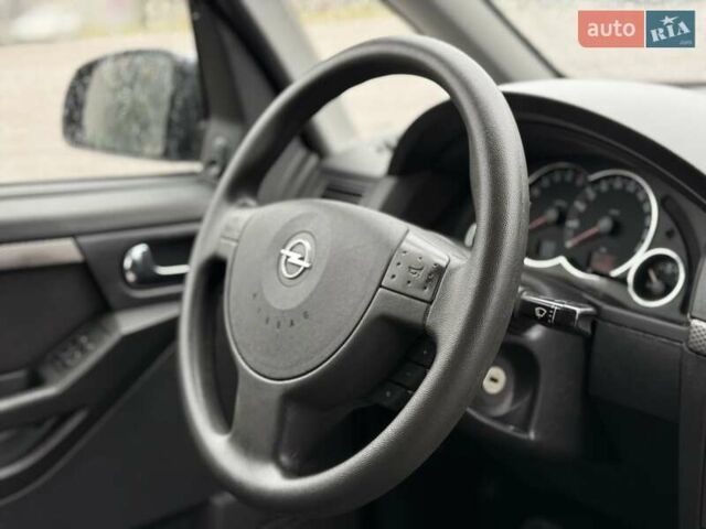 Синий Опель Мерива, объемом двигателя 1.6 л и пробегом 142 тыс. км за 3950 $, фото 44 на Automoto.ua