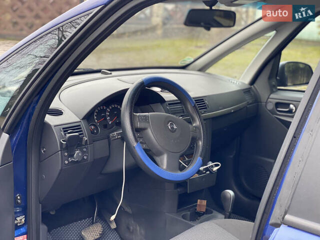 Синий Опель Мерива, объемом двигателя 1.6 л и пробегом 101 тыс. км за 4850 $, фото 26 на Automoto.ua