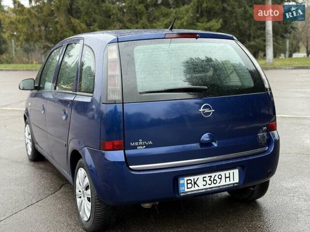 Синий Опель Мерива, объемом двигателя 1.6 л и пробегом 142 тыс. км за 3950 $, фото 27 на Automoto.ua