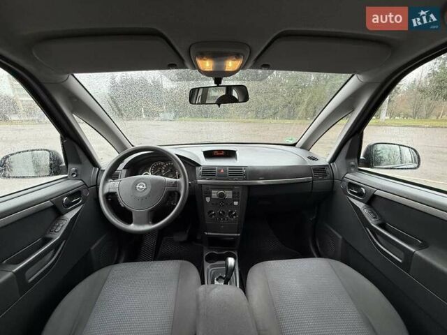 Синий Опель Мерива, объемом двигателя 1.6 л и пробегом 142 тыс. км за 3950 $, фото 67 на Automoto.ua