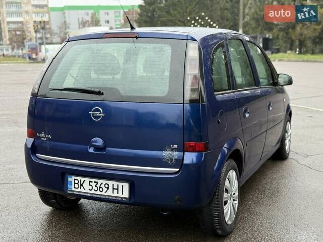Синий Опель Мерива, объемом двигателя 1.6 л и пробегом 142 тыс. км за 3950 $, фото 19 на Automoto.ua
