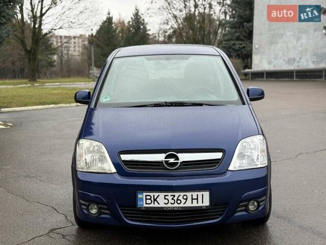 Синий Опель Мерива, объемом двигателя 1.6 л и пробегом 142 тыс. км за 3950 $, фото 11 на Automoto.ua
