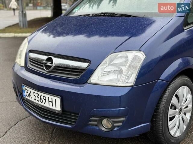 Синий Опель Мерива, объемом двигателя 1.6 л и пробегом 142 тыс. км за 3950 $, фото 4 на Automoto.ua