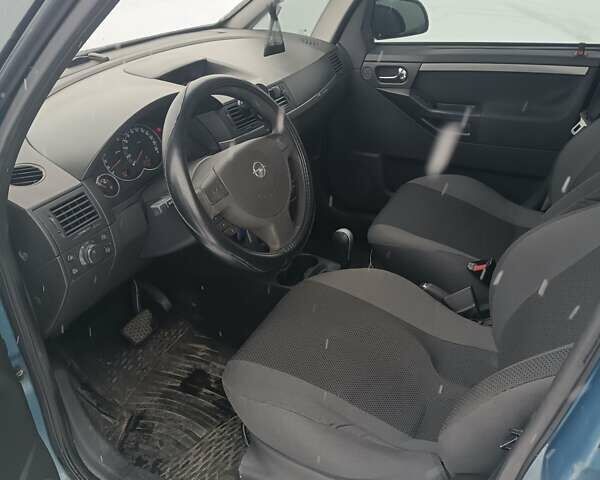 Синий Опель Мерива, объемом двигателя 1.6 л и пробегом 141 тыс. км за 4000 $, фото 2 на Automoto.ua