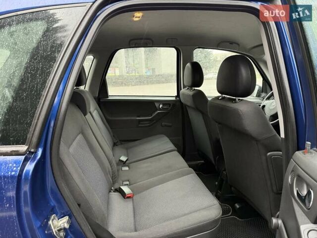 Синий Опель Мерива, объемом двигателя 1.6 л и пробегом 142 тыс. км за 3950 $, фото 45 на Automoto.ua