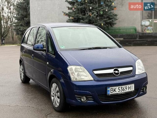 Синий Опель Мерива, объемом двигателя 1.6 л и пробегом 142 тыс. км за 3950 $, фото 13 на Automoto.ua