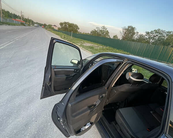 Синий Опель Мерива, объемом двигателя 1.69 л и пробегом 262 тыс. км за 3550 $, фото 16 на Automoto.ua