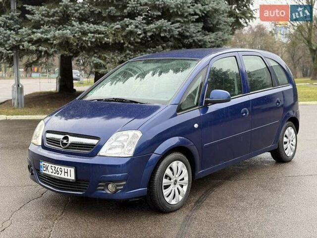 Синий Опель Мерива, объемом двигателя 1.6 л и пробегом 142 тыс. км за 3950 $, фото 2 на Automoto.ua