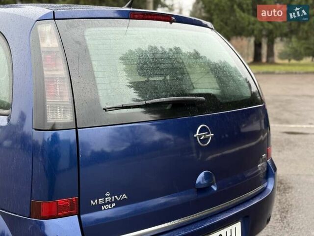 Синий Опель Мерива, объемом двигателя 1.6 л и пробегом 142 тыс. км за 3950 $, фото 28 на Automoto.ua
