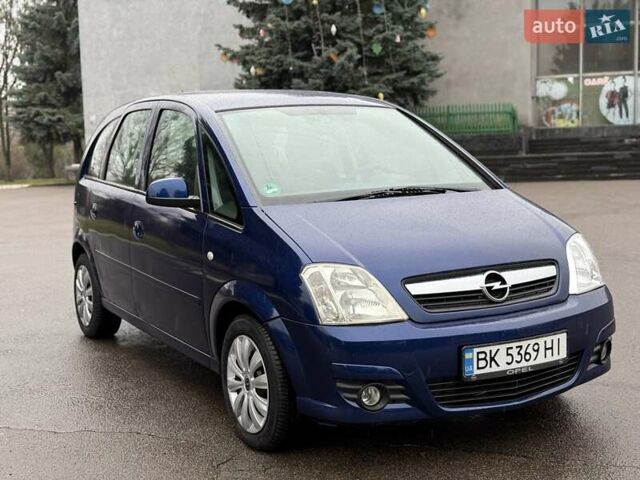 Синий Опель Мерива, объемом двигателя 1.6 л и пробегом 142 тыс. км за 3950 $, фото 12 на Automoto.ua