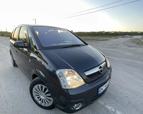 Синий Опель Мерива, объемом двигателя 1.69 л и пробегом 262 тыс. км за 3550 $, фото 7 на Automoto.ua