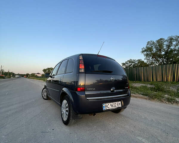 Синий Опель Мерива, объемом двигателя 1.69 л и пробегом 262 тыс. км за 3550 $, фото 1 на Automoto.ua