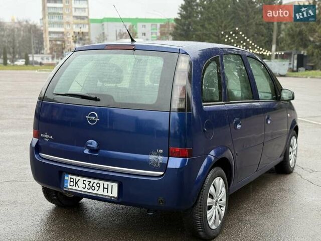 Синий Опель Мерива, объемом двигателя 1.6 л и пробегом 142 тыс. км за 3950 $, фото 20 на Automoto.ua