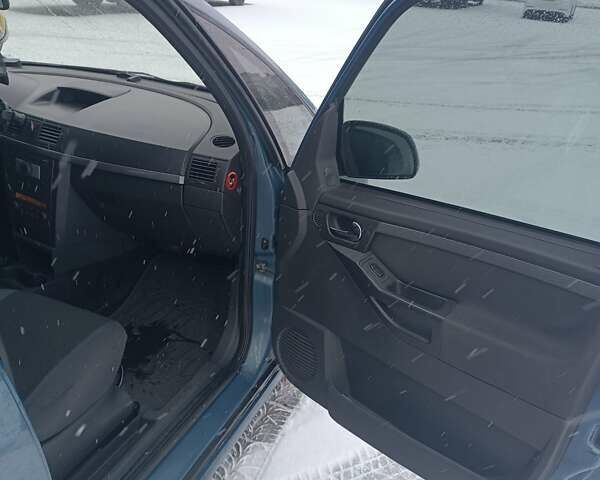 Синий Опель Мерива, объемом двигателя 1.6 л и пробегом 141 тыс. км за 4000 $, фото 3 на Automoto.ua