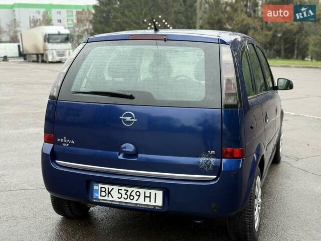 Синий Опель Мерива, объемом двигателя 1.6 л и пробегом 142 тыс. км за 3950 $, фото 21 на Automoto.ua