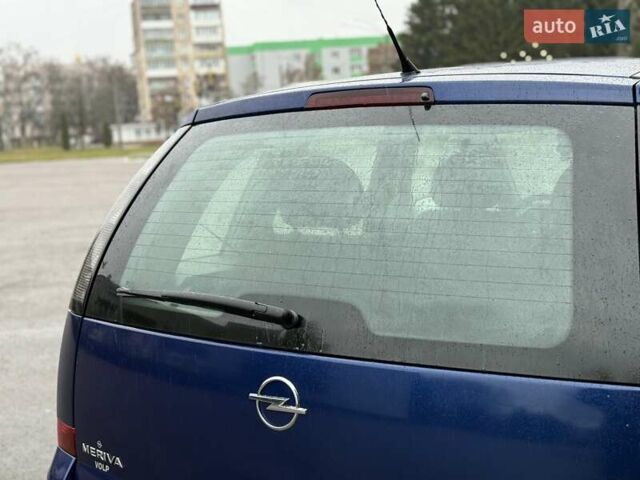 Синий Опель Мерива, объемом двигателя 1.6 л и пробегом 142 тыс. км за 3950 $, фото 22 на Automoto.ua