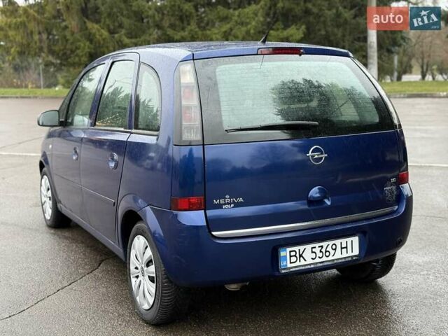 Синий Опель Мерива, объемом двигателя 1.6 л и пробегом 142 тыс. км за 3950 $, фото 26 на Automoto.ua