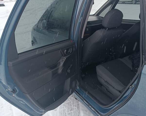 Синий Опель Мерива, объемом двигателя 1.6 л и пробегом 141 тыс. км за 4000 $, фото 6 на Automoto.ua