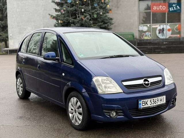 Синий Опель Мерива, объемом двигателя 1.6 л и пробегом 142 тыс. км за 3950 $, фото 15 на Automoto.ua