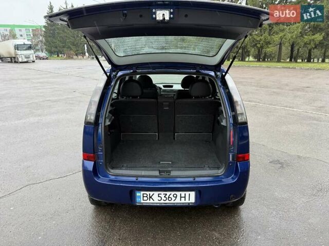 Синий Опель Мерива, объемом двигателя 1.6 л и пробегом 142 тыс. км за 3950 $, фото 30 на Automoto.ua