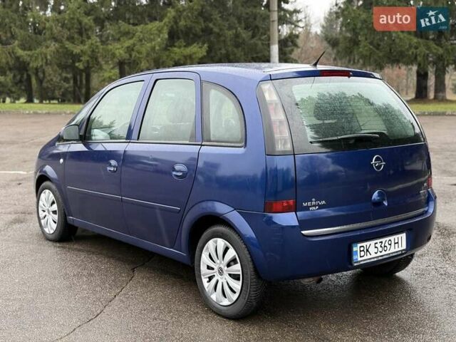 Синий Опель Мерива, объемом двигателя 1.6 л и пробегом 142 тыс. км за 3950 $, фото 25 на Automoto.ua