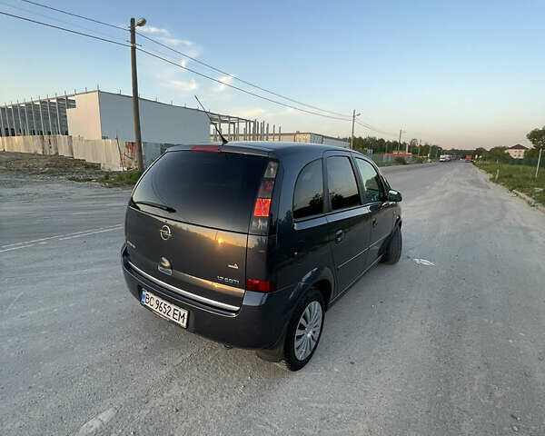 Синий Опель Мерива, объемом двигателя 1.69 л и пробегом 262 тыс. км за 3550 $, фото 12 на Automoto.ua